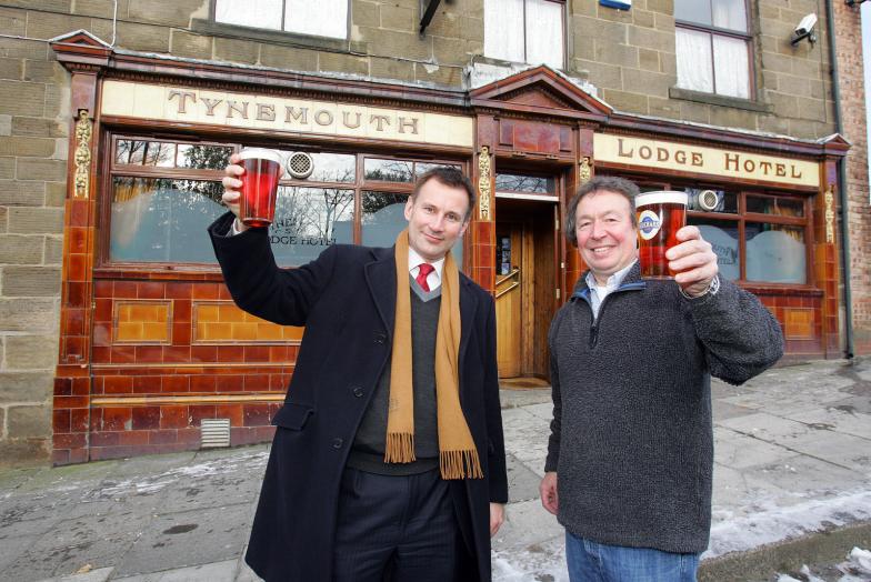 Jeremy Hunt in front of Lodge